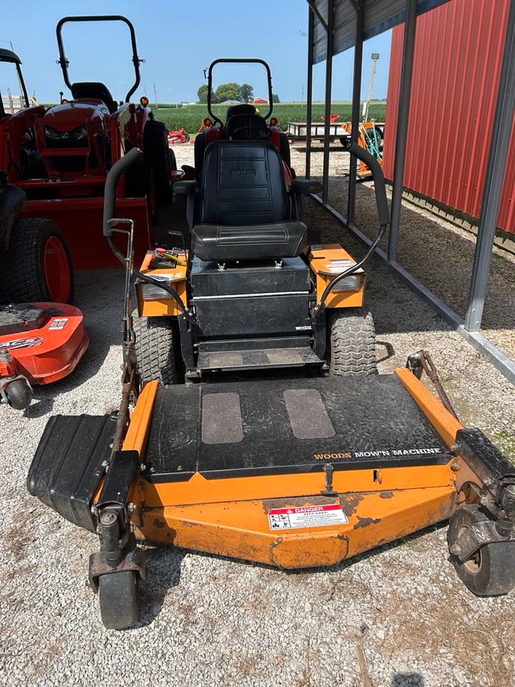 Woods Mowing Machine  $1,250.00